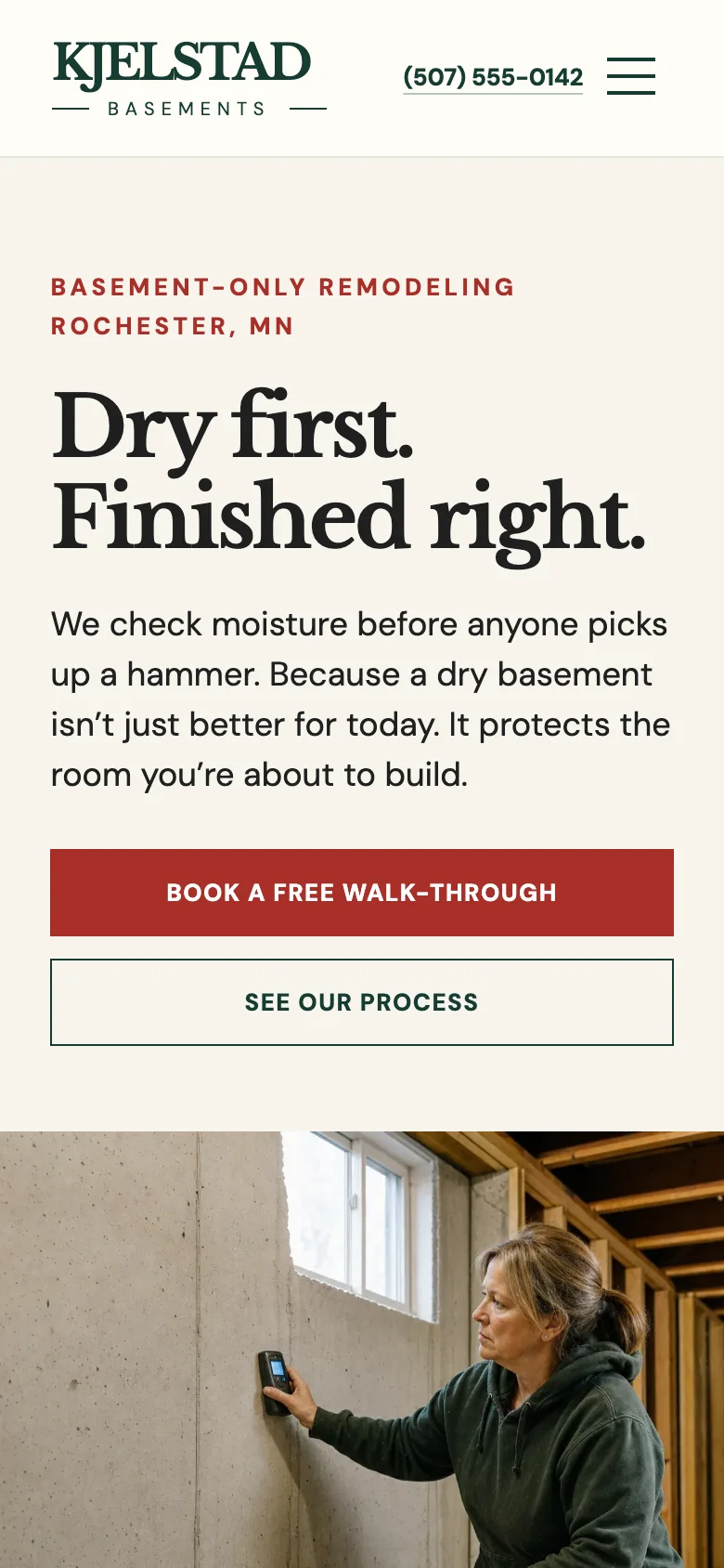 Kjelstad Basements home page on a phone, built by Theo