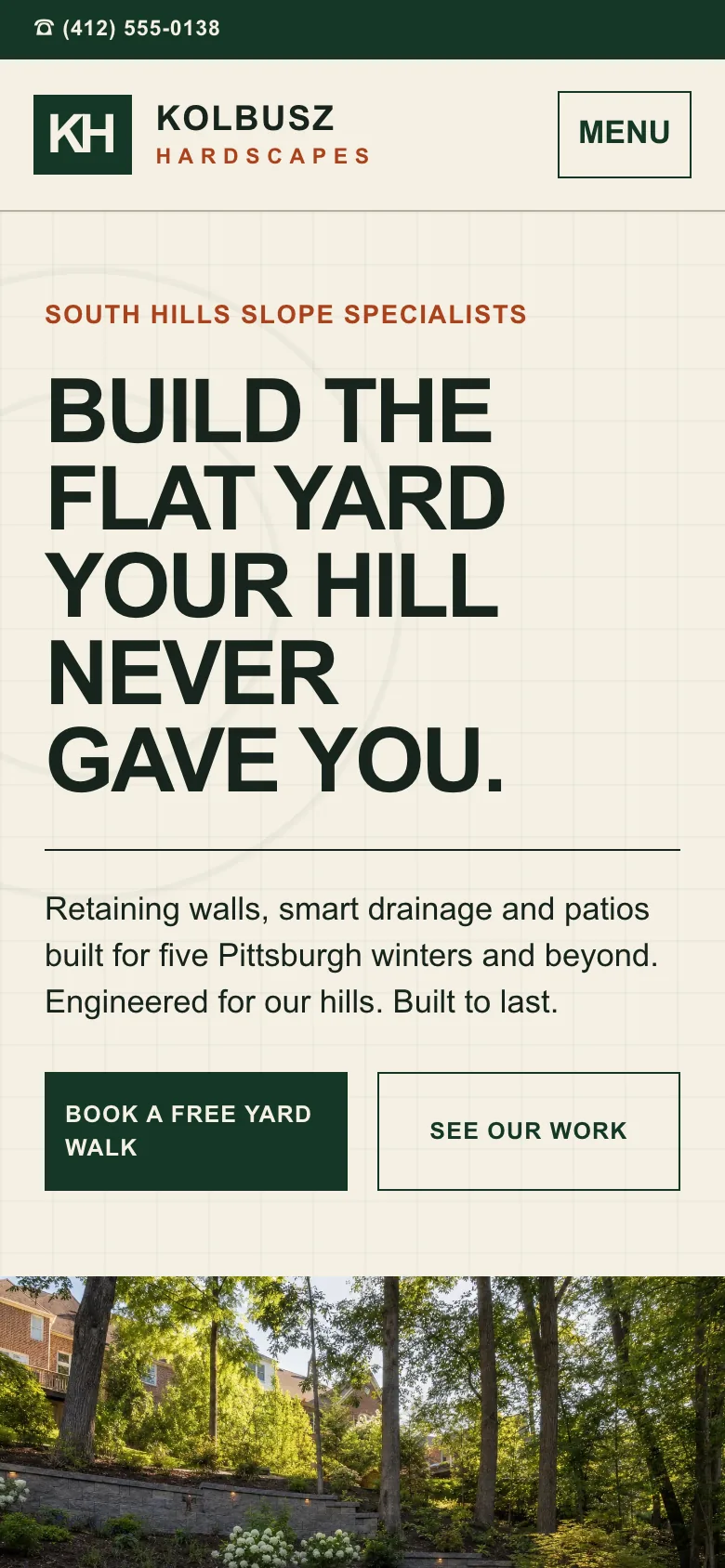Kolbusz Hardscapes home page on a phone, built by Theo